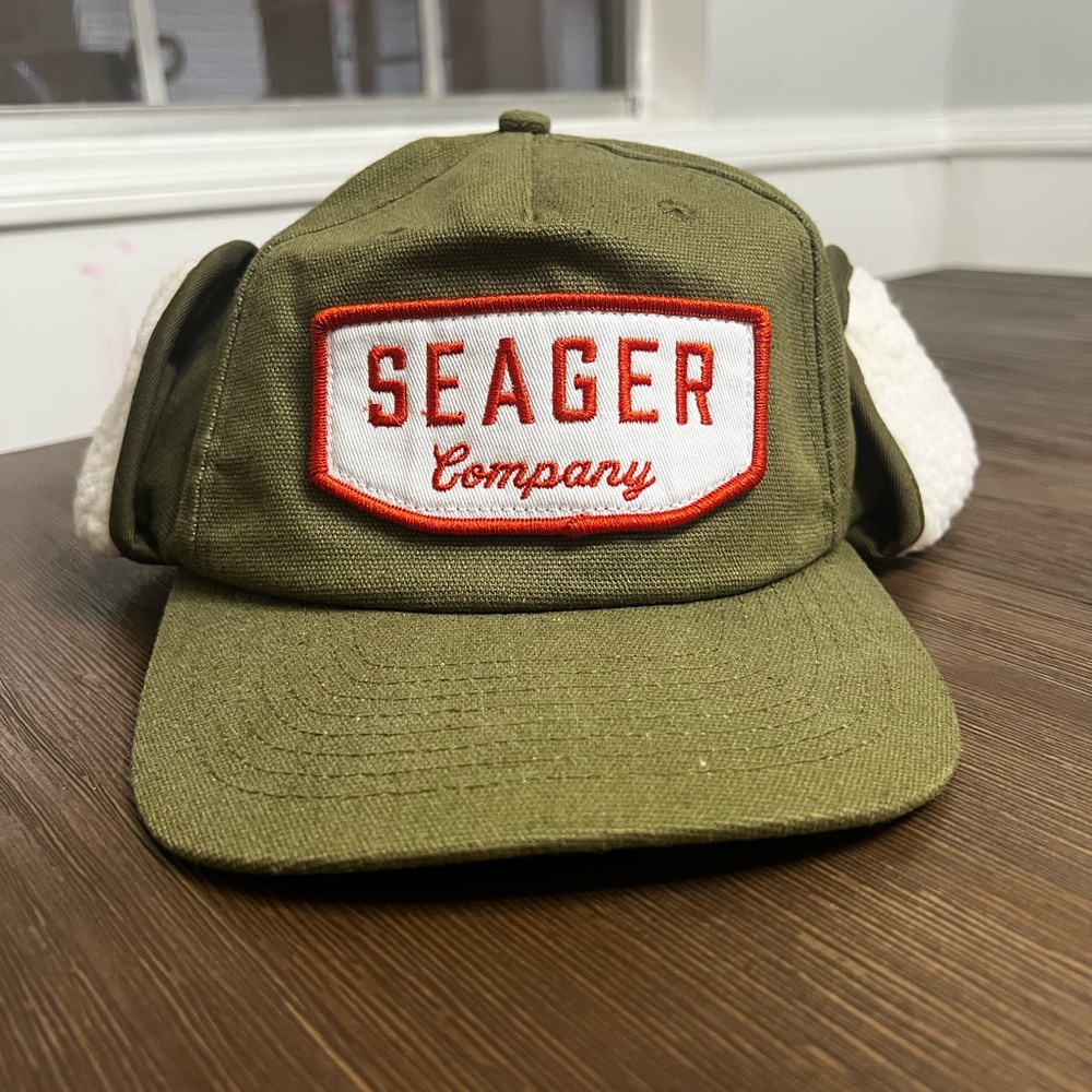 Seager Flapjack hat. Hunter green with white/red patch